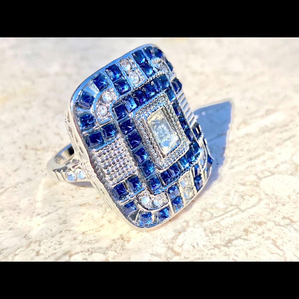 Fancy ring. Size shows 9-9 1/4. Large presence.